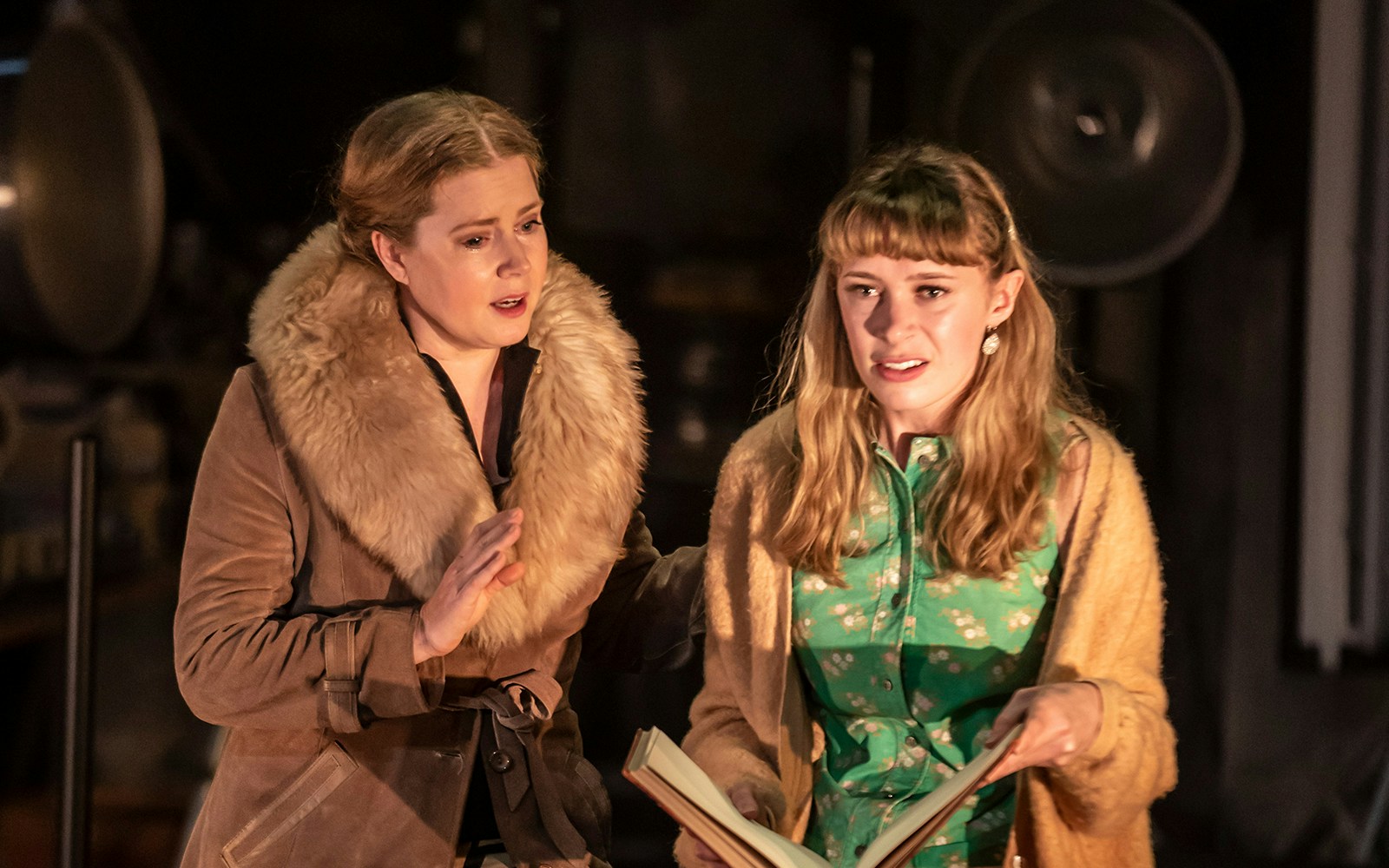 Two actors performing a scene from "The Glass Menagerie" on stage.