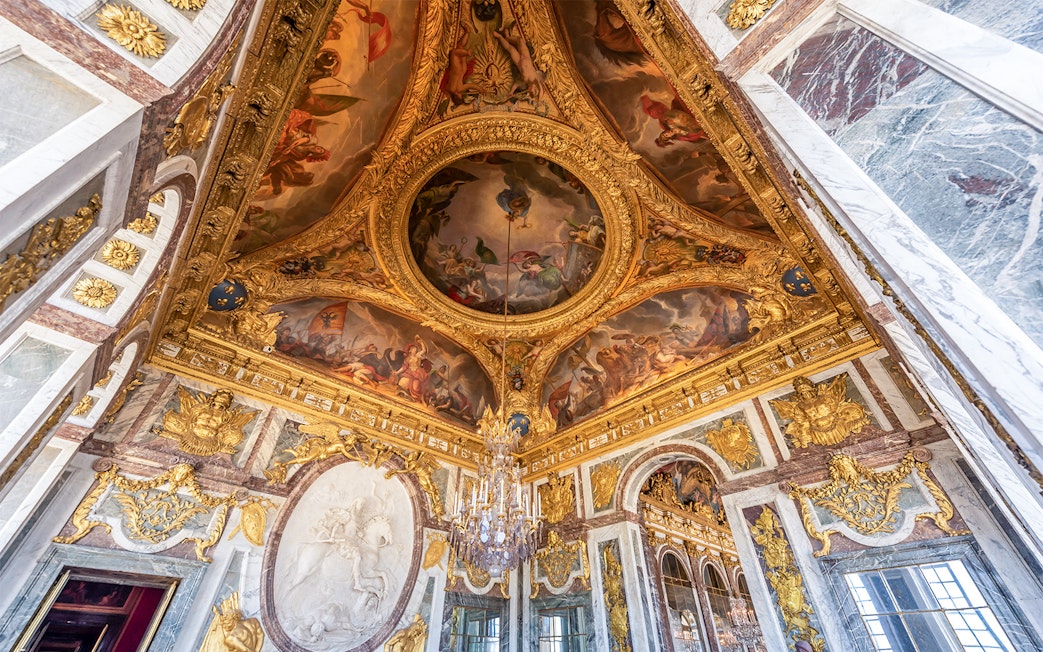 Ornate ceiling and frescoes in the Museum of the History of France, Versailles.