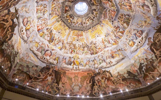 Florence Cathedral dome fresco depicting Last Judgment, part of Renaissance tour.