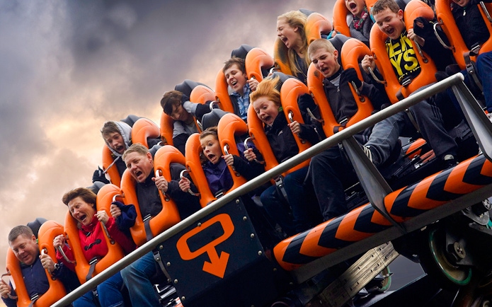 Riders experiencing the Oblivion roller coaster at Alton Towers.