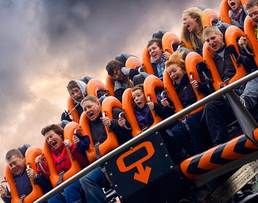 Riders experiencing the Oblivion roller coaster at Alton Towers.