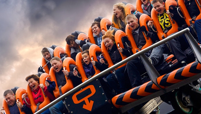 Riders experiencing the Oblivion roller coaster at Alton Towers.