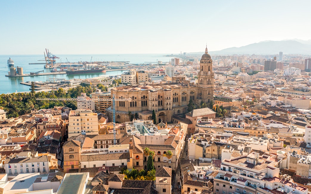 Aerial view of Malaga Cathedral and cityscape near Alcazaba, Malaga, Spain.