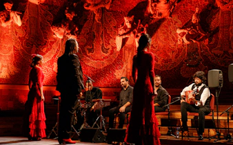 Flamenco performers on stage at Poliorama Theater, Barcelona.