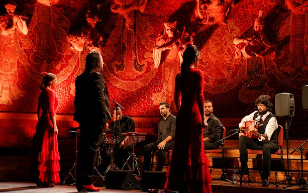 Flamenco performers on stage at Poliorama Theater, Barcelona.