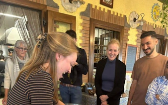Cooking class participants making pasta at an Amalfi Coast farmhouse.