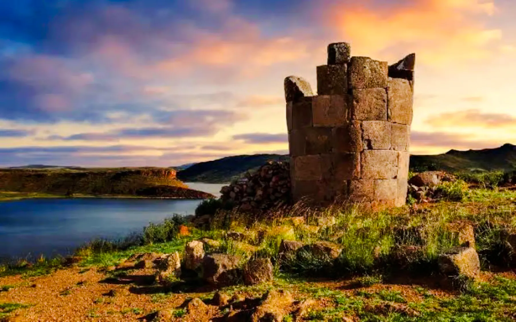 Sillustani Burial Tower near Lake Umayo at sunset, Puno, Peru.