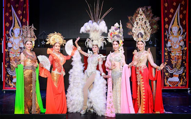 Performers in elaborate costumes at Siam Dragon Cabaret Show, Thailand.