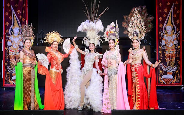 Performers in elaborate costumes at Siam Dragon Cabaret Show, Thailand.