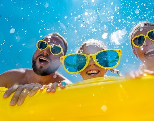 Visitors enjoying Banana Flip at ESCAPE Theme Park Penang, a popular tourist attraction in Malaysia