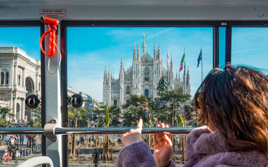 Hop-on hop-off bus view of Milan Cathedral, Italy.