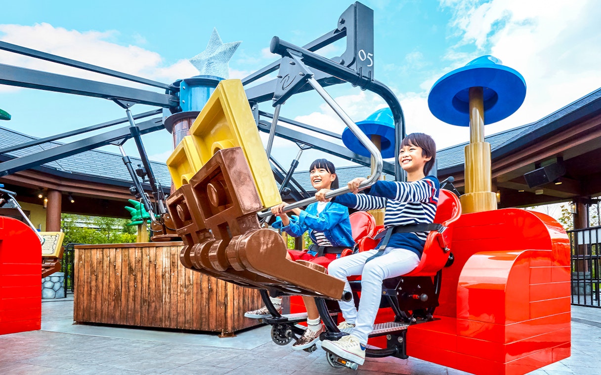 Children enjoying a ride at Legoland Japan.