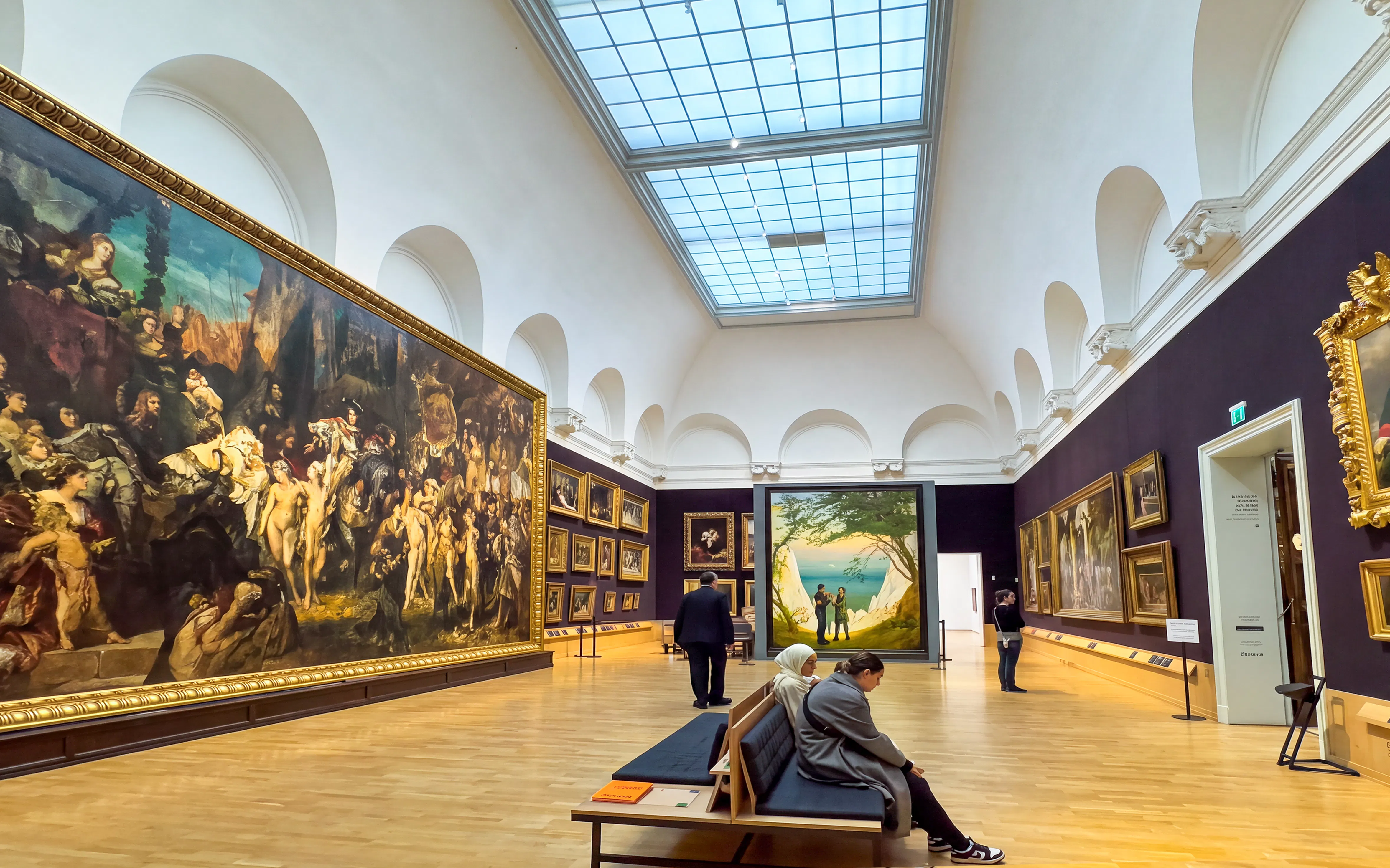 Grand 19th-century gallery hall with paintings inside Hamburger Kunsthalle, Hamburg, Germany.