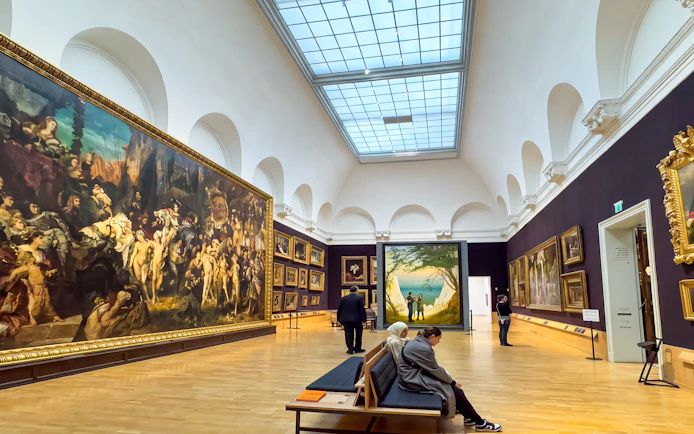 Grand 19th-century gallery hall with paintings inside Hamburger Kunsthalle, Hamburg, Germany.