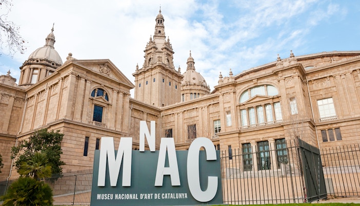 National Art Museum of Catalonia facade with MNAC sign in Barcelona.