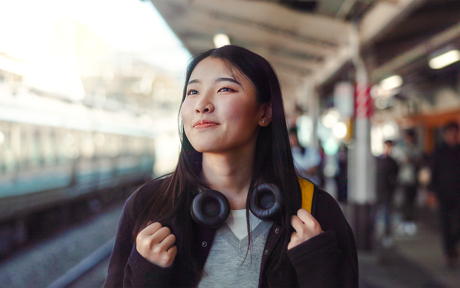 Woman at a train station in Japan