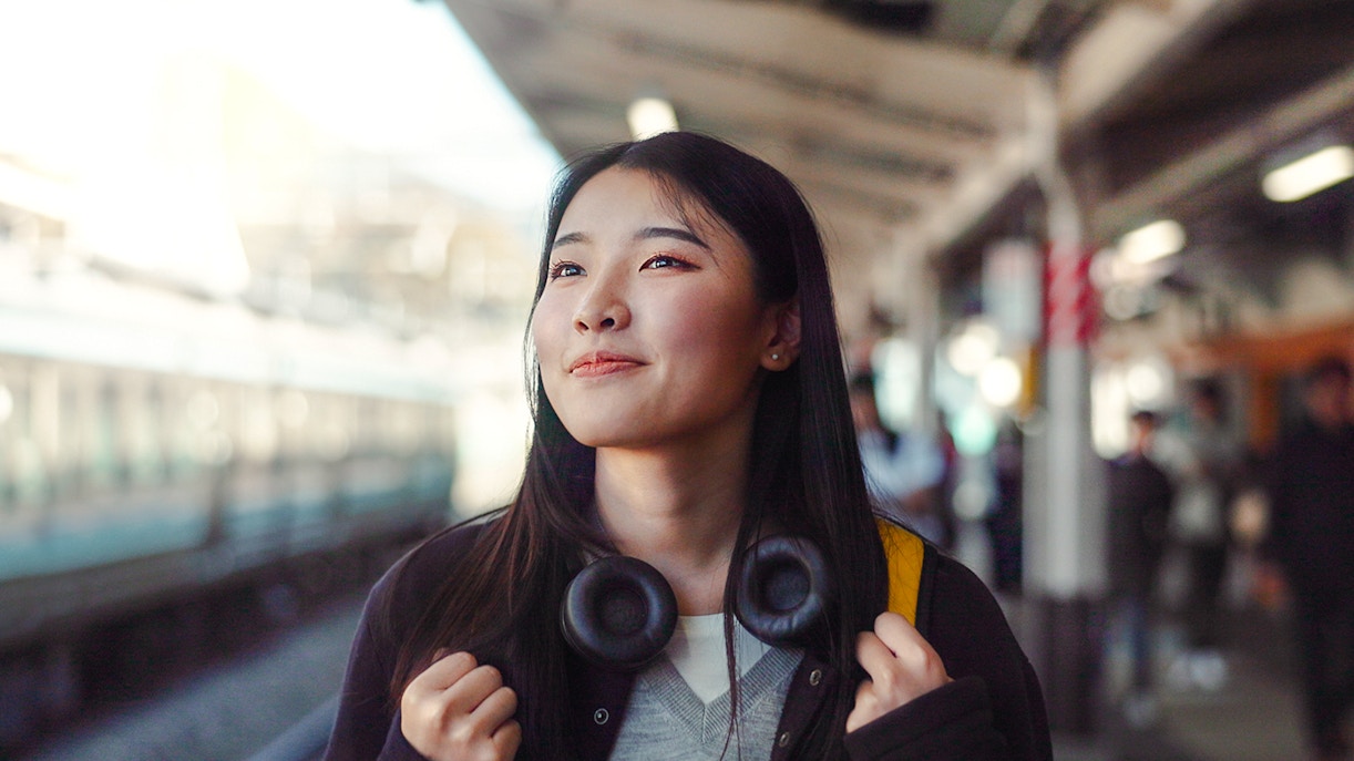 Woman at a train station in Japan