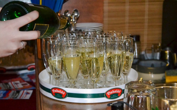 Pouring drinks on the historic ship Maria Croon, Vltava River, Prague.
