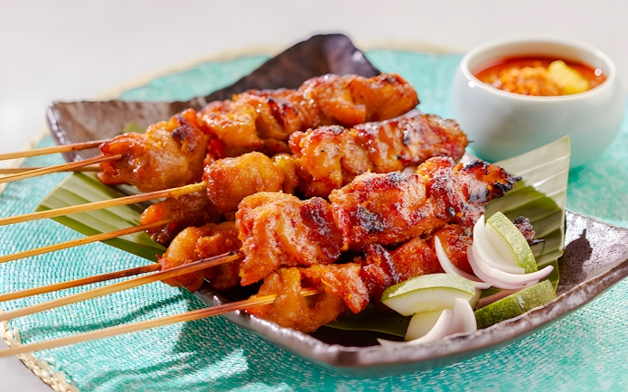 Skewers at House of Seafood, Clarke Quay, Singapore with dipping sauce.