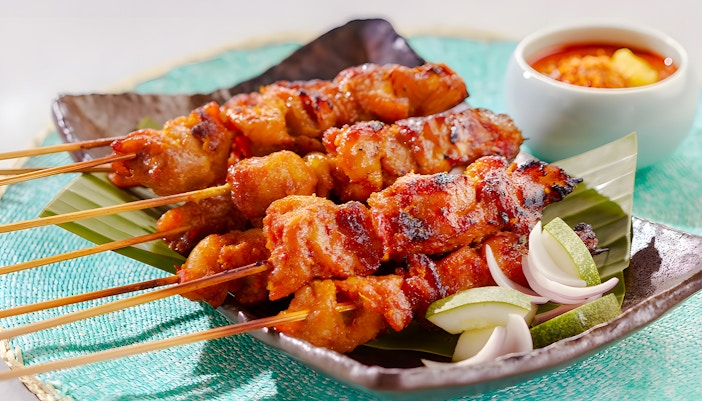 Skewers at House of Seafood, Clarke Quay, Singapore with dipping sauce.