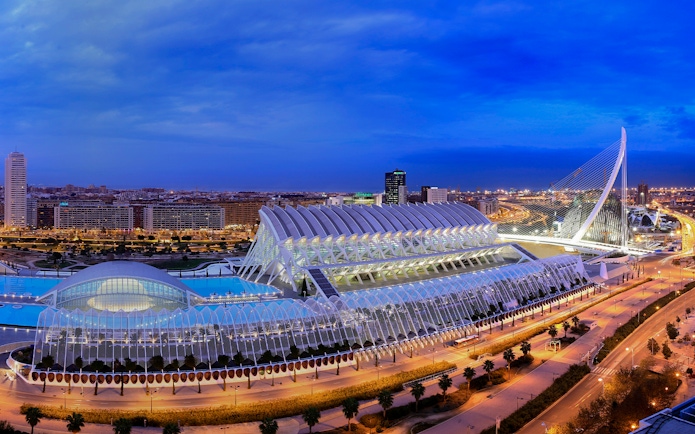 Hemisfèric and Science Museum in Valencia at dusk, showcasing modern architecture.