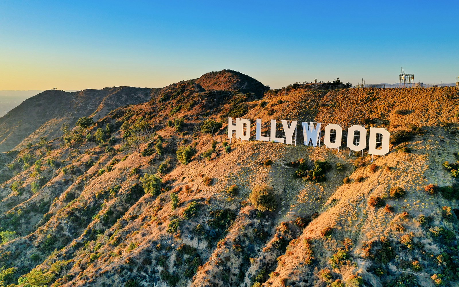 Hollywood Sign on hills at sunset, Los Angeles, California.