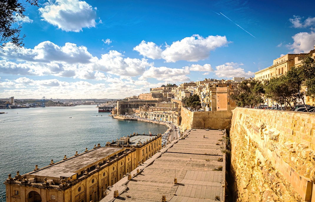 Valletta Waterfront with historic buildings and harbor view, Malta day tour.