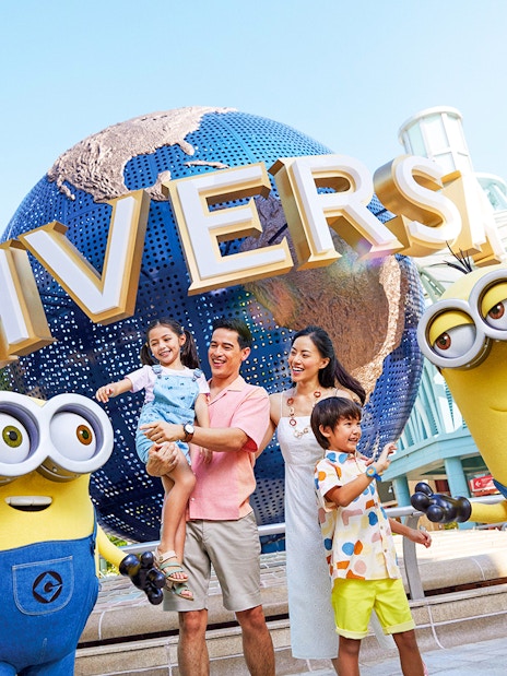Family enjoying Universal Studios Singapore with Minion characters.