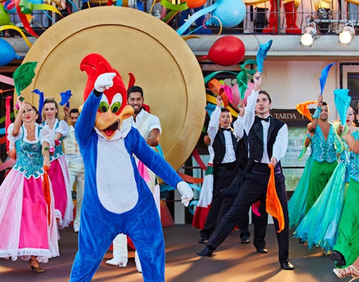 Performance of people dressed up in vibrant costumes