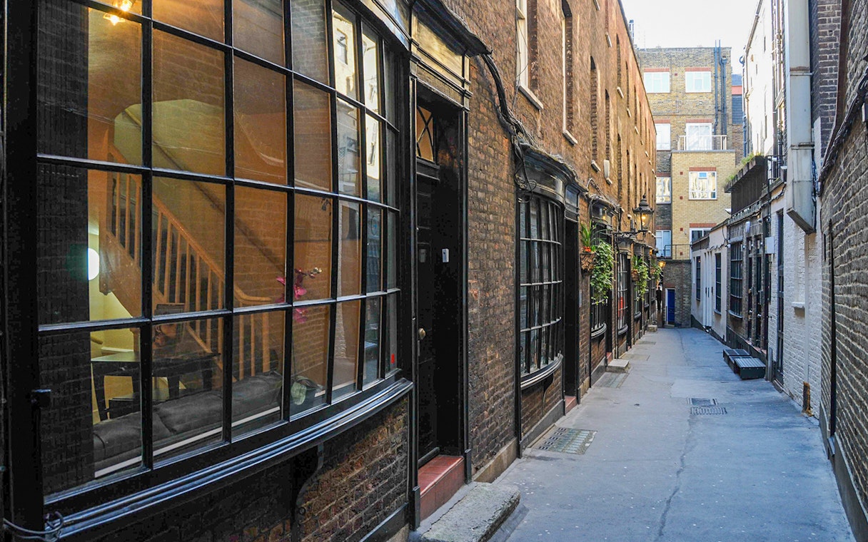 Cecil Court alleyway in London, featured in Harry Potter film locations walking tour.