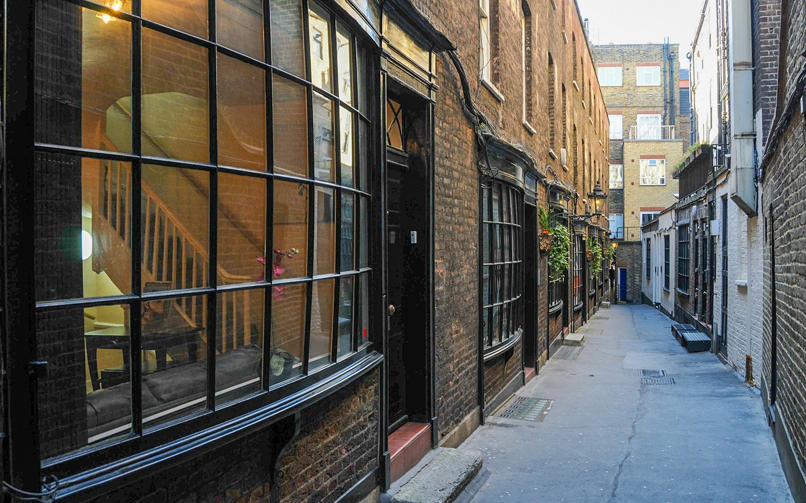 Cecil Court alleyway in London, featured in Harry Potter film locations walking tour.