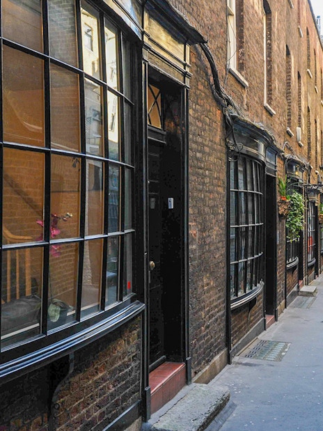 Cecil Court alleyway in London, featured in Harry Potter film locations walking tour.