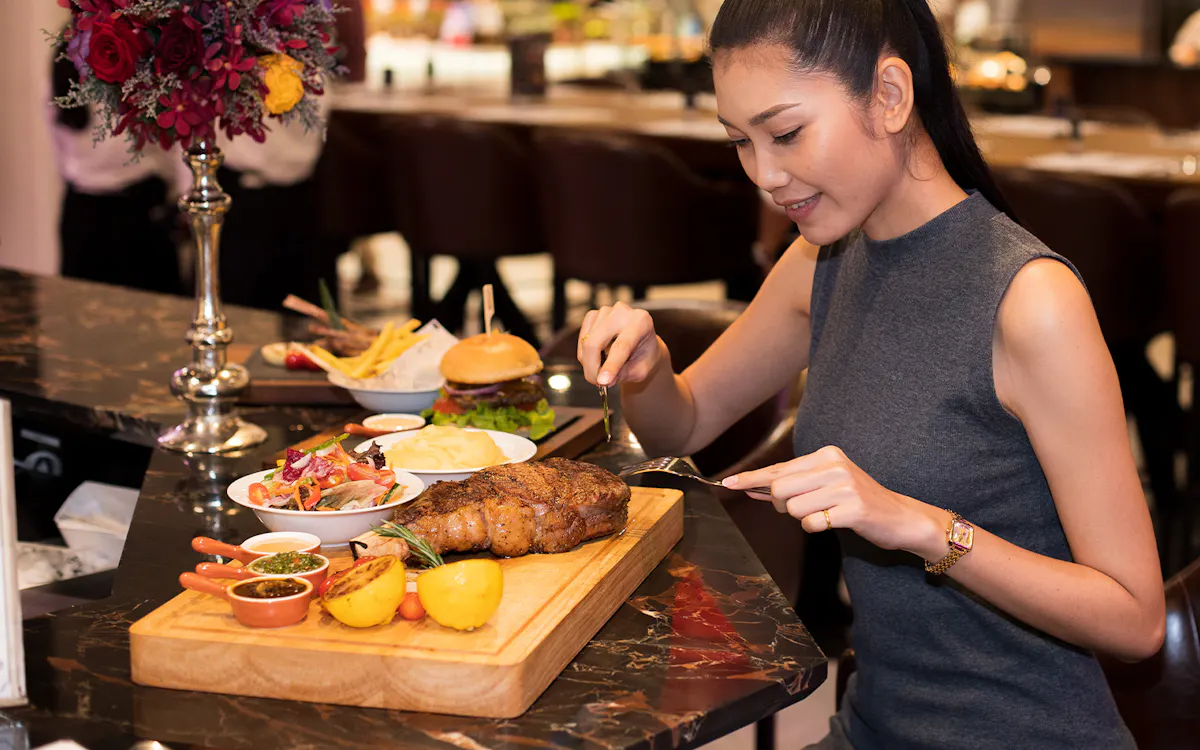 Steak dinner served at a restaurant table.