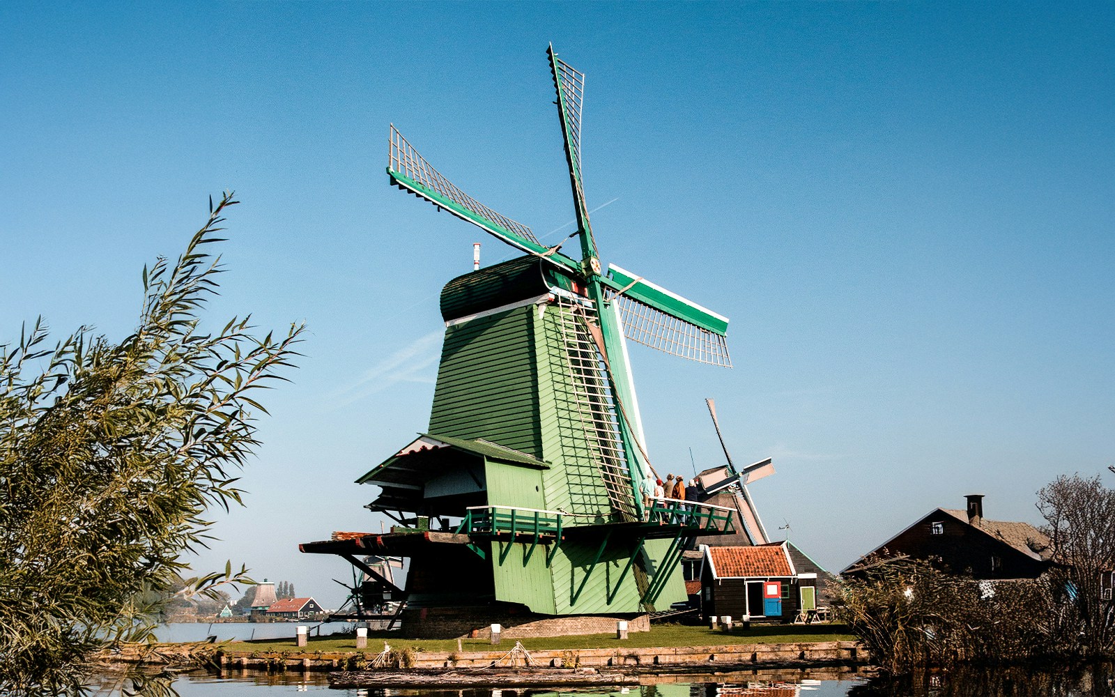 Windmill at Zaanse Schans with clear blue sky in the Netherlands.