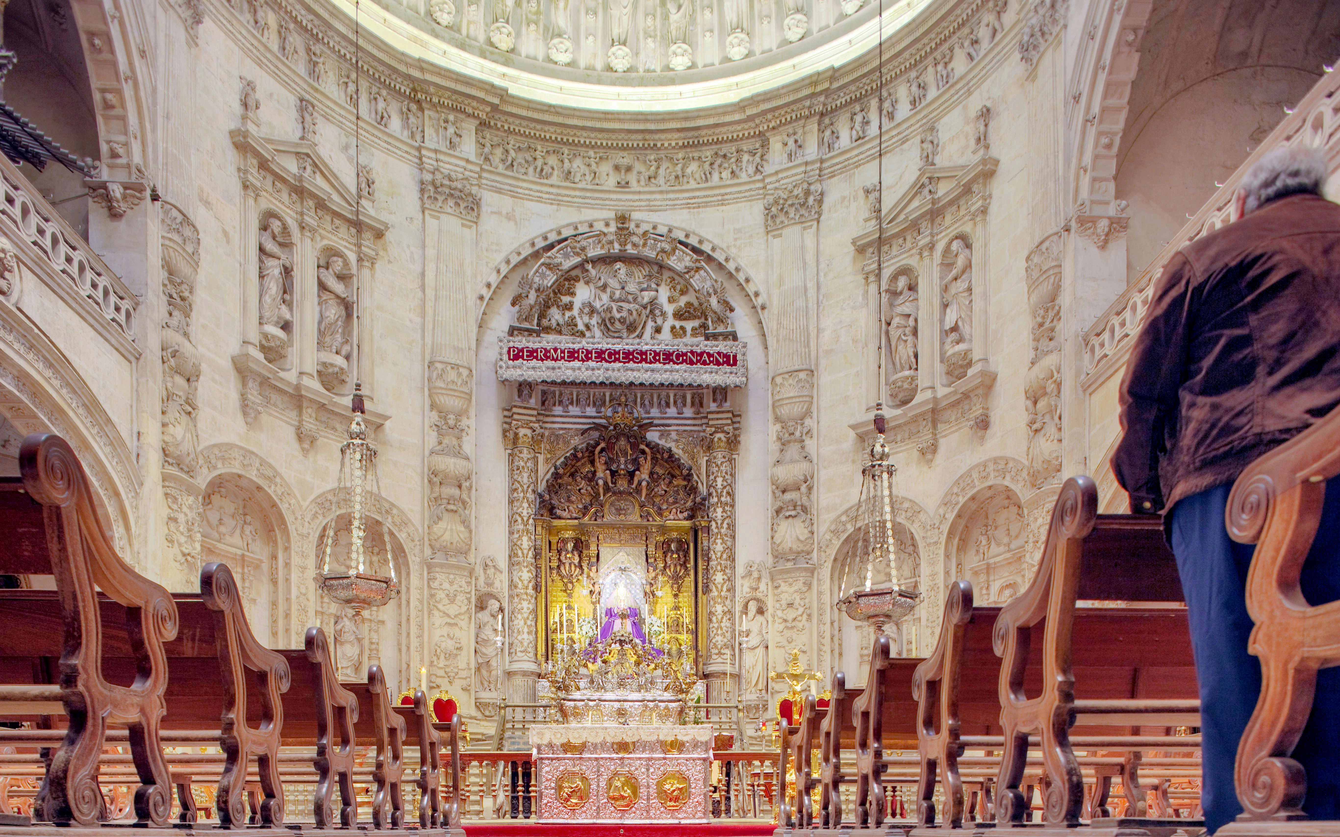 Royal Chapel interior with ornate altar and carvings, Seville Cathedral.