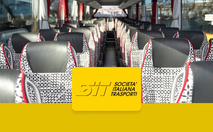 Shuttle bus interior with patterned seats, Società Italiana Trasporti logo.