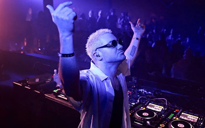 DJ performing at Our House Hi Ibiza nightclub.