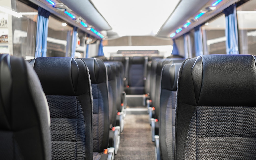 Interior of a tour bus used for Stonehenge excursions with audio guide.