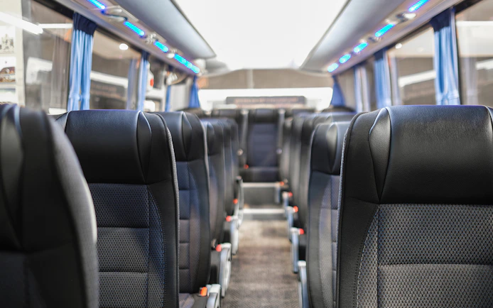 Interior of a tour bus used for Stonehenge excursions with audio guide.