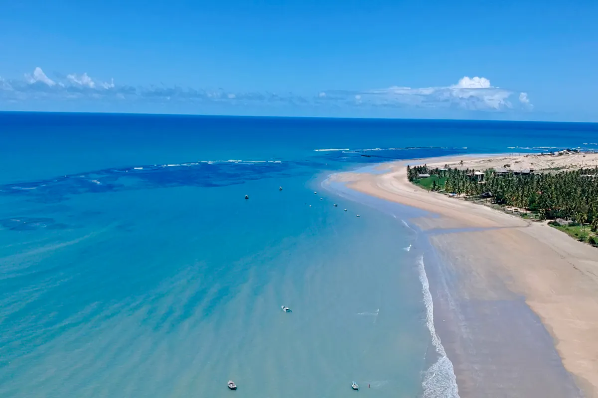 Aerial view of Icaraí de Amontada beach with turquoise waters and sandy shoreline, Sao Paulo.