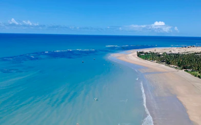 Aerial view of Icaraí de Amontada beach with turquoise waters and sandy shoreline, Sao Paulo.