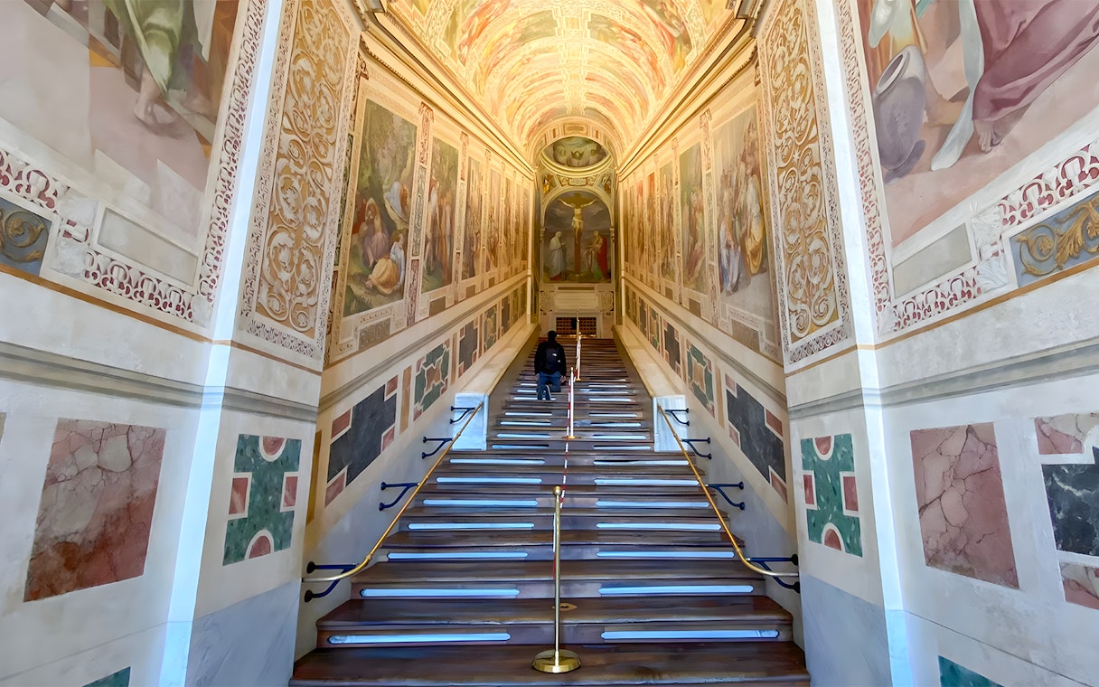 St. John Lateran Basilica interior staircase with frescoes in Rome, Italy.
