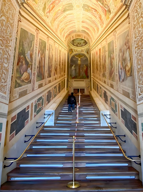St. John Lateran Basilica interior staircase with frescoes in Rome, Italy.