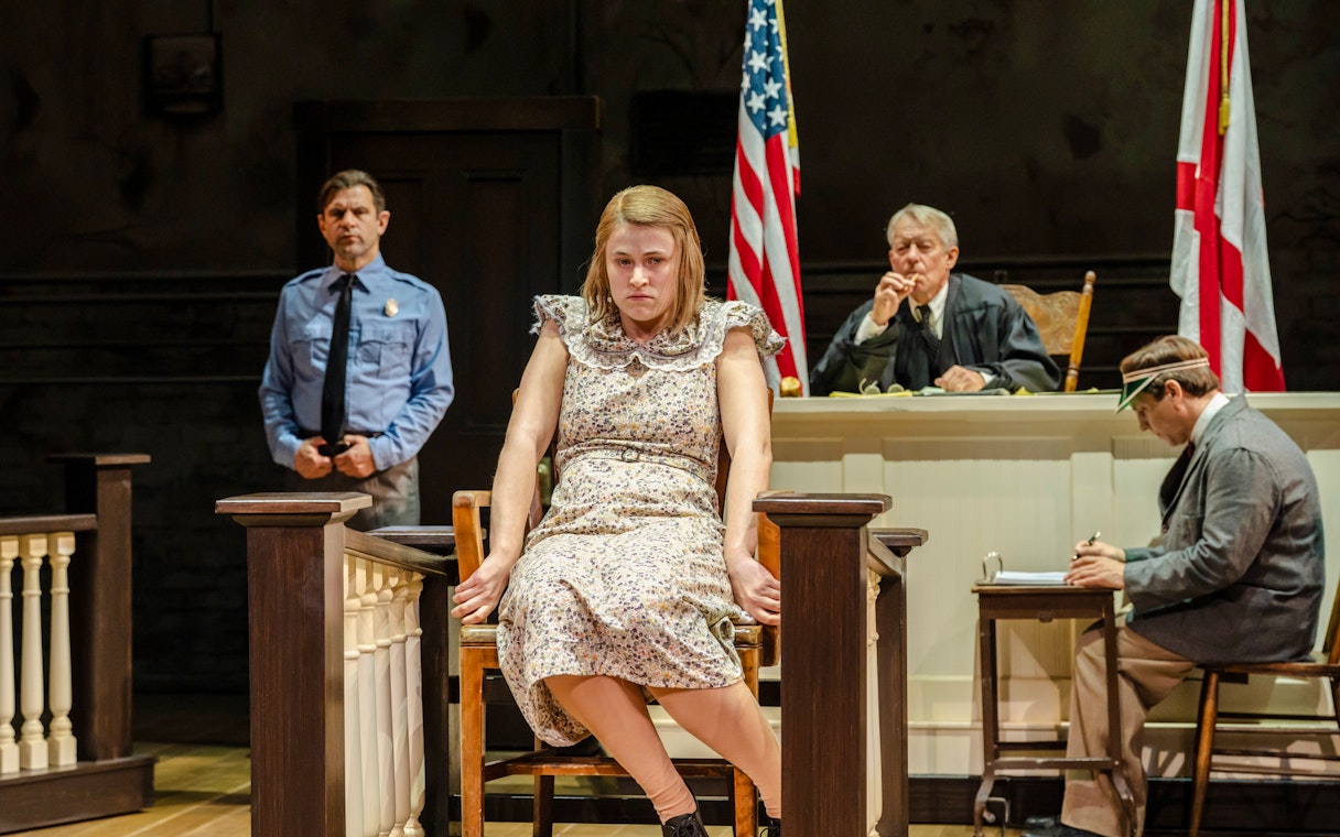 Courtroom scene from "To Kill a Mockingbird" West End show with actors in character.