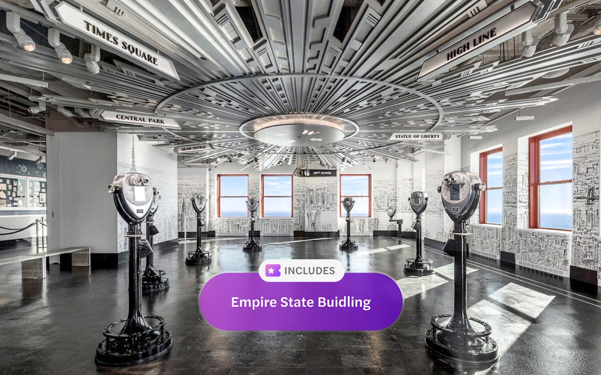 Empire State Building observatory interior with viewing binoculars and cityscape decor.