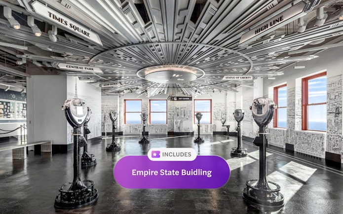 Empire State Building observatory interior with viewing binoculars and cityscape decor.