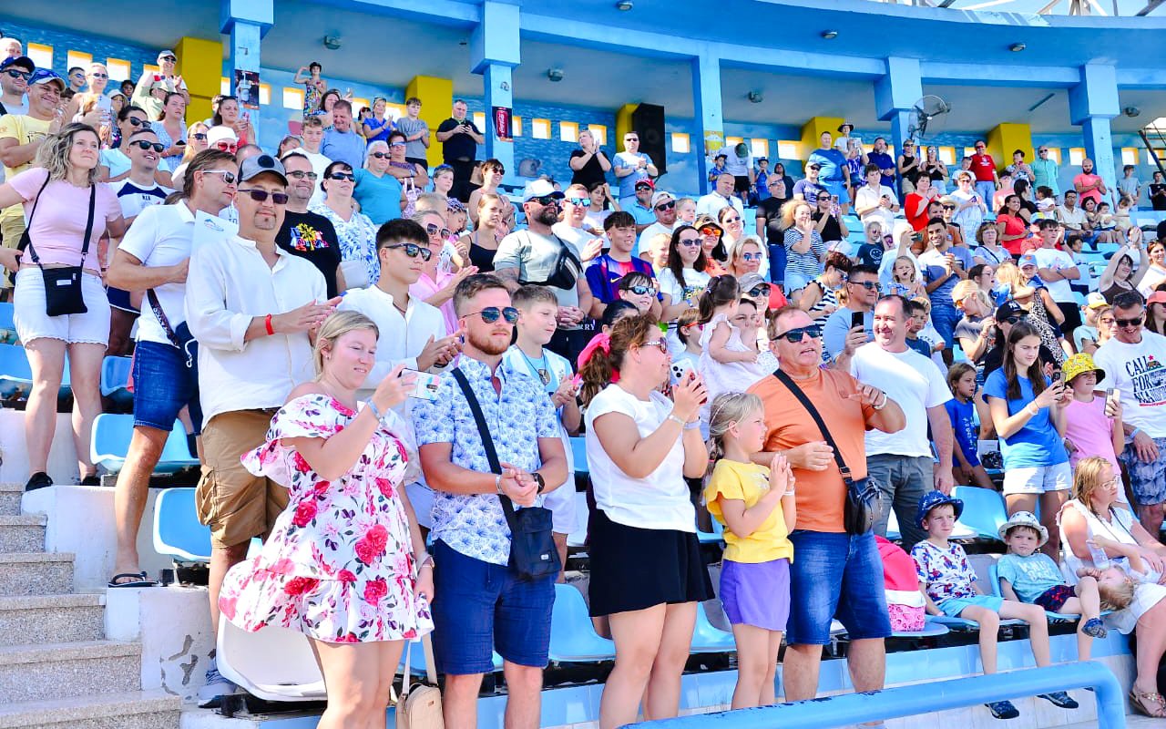 Audience watching a dolphin show at Hurghada stadium.