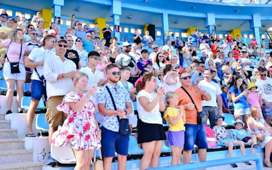 Audience watching a dolphin show at Hurghada stadium.