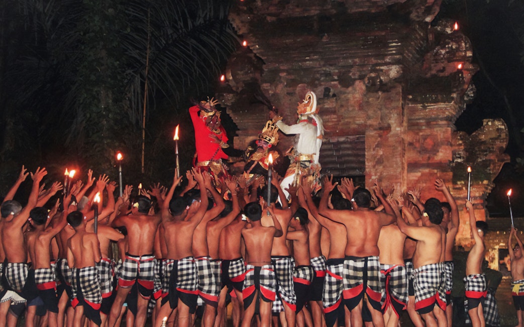 Kecak dance performance at Arma Museum Resort, Bali, with dancers in traditional attire.