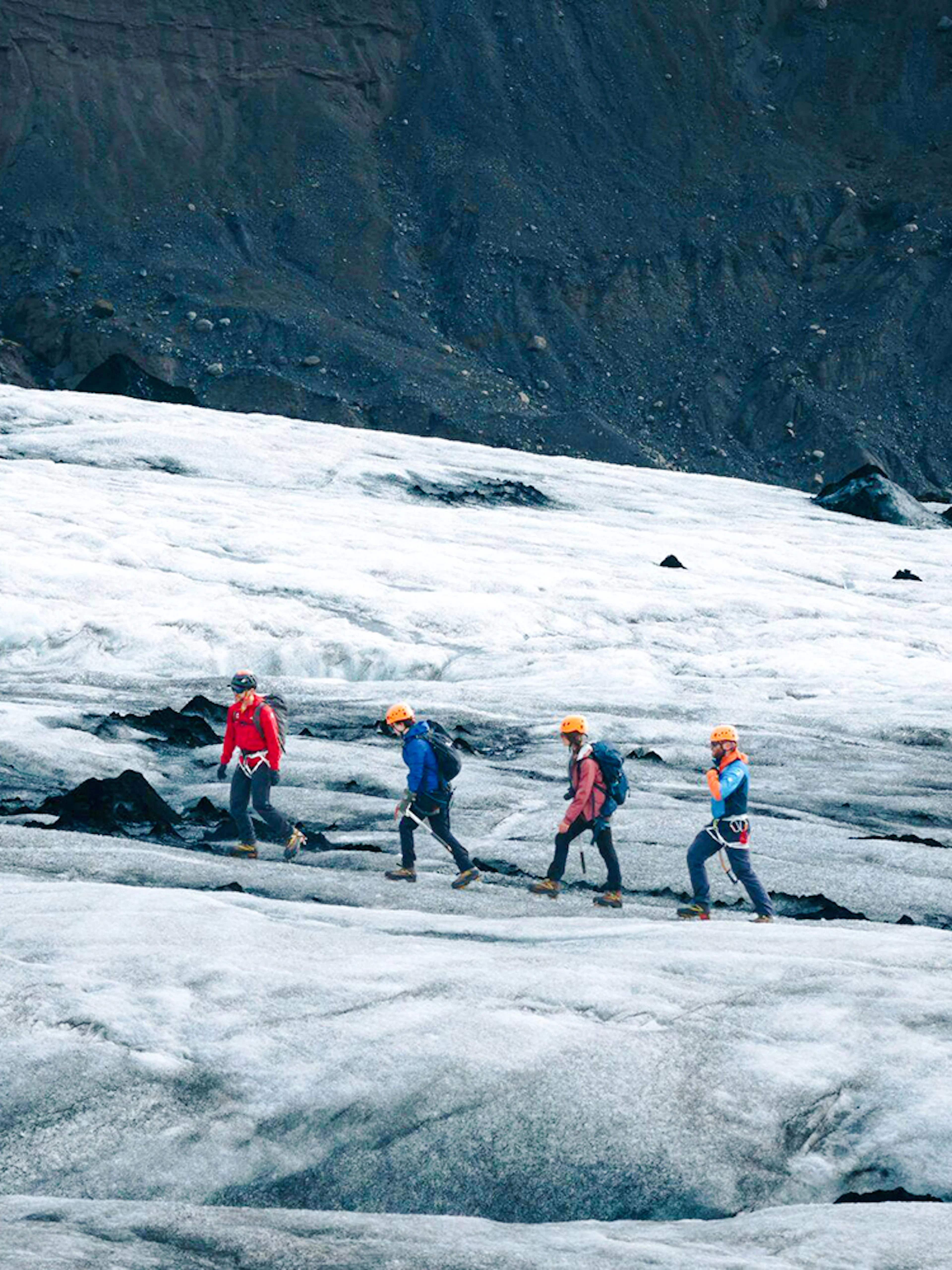 Guests hiking on Solheimajökill Glacier in Iceland.